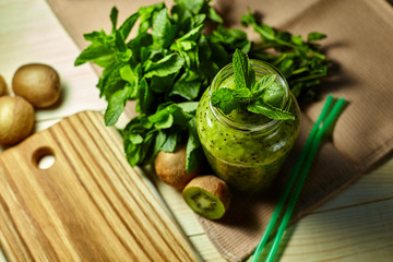 Fresh green smoothie with kiwi and mint . Love for a healthy raw food concept. Healthy eating. Fruit Smoothies. Kiwi.