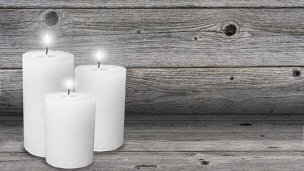 Fototapeta na wymiar candle lights in cozy wooden room