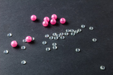 colorful beads and crystals on a black background