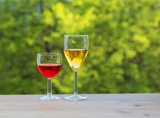 Two wine glasses on table