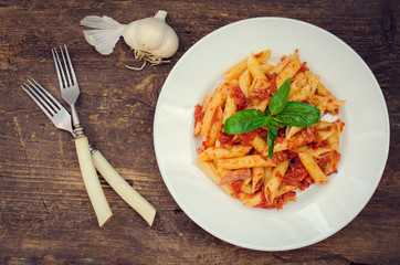 Penne pasta with tuna and basil