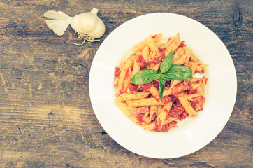 Penne pasta with tuna and basil