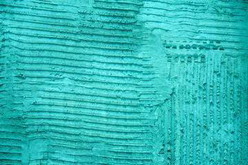 Cyan textured cement wall