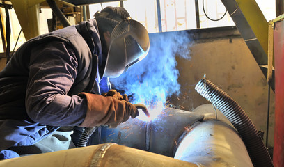 Fototapeta woman welder welding obraz
