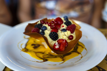 ice cream with fruits in cone