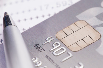 Finance Concepts, pen and credit card with passbook as backgroun