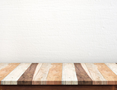 Empty tropical wood table top with white concrete wall,Mock up f