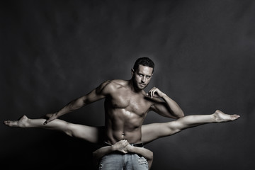 sexy young couple dancing in studio