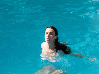 pretty sexy woman in swimming pool