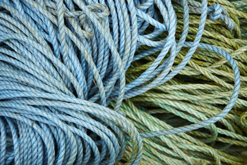 A full page of green and blue synthetic rope background texture