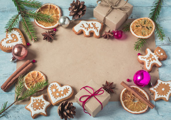 Background gifts, fir branches, cones, Christmas cookies and ora