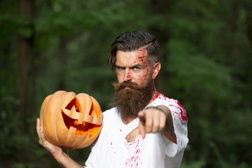 halloween man with pumpkin and blood