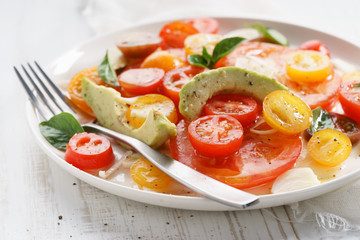 Tomato, avocado and red onion salad