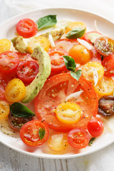 Tomato, avocado and red onion salad