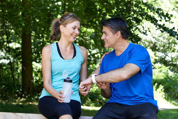 Mature Couple Exercising In Countryside Together