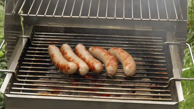 Grilled sausages on a grill
