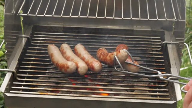 Grilled sausages on a grill