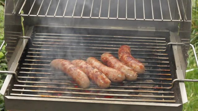 Grilled sausages on a grill