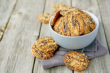 Chocolate chip cookies on a grey wooden table