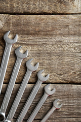 New tools on a grey wooden table