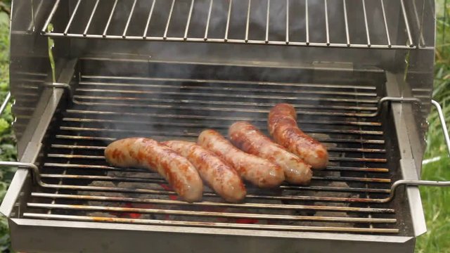 Grilled sausages on a grill