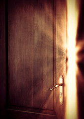 Fototapeta premium Light Trough Gap of Open Door