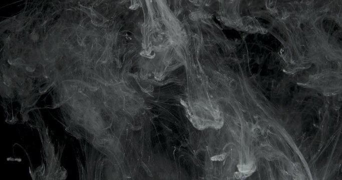 Creative Ink In Water. Cosmic interstellar concept with macro ink in water  effect looking something more astronomical. 