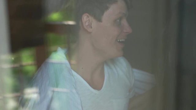 couple have fun view through tulle.