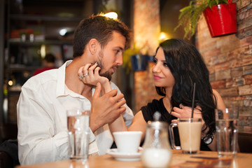 Young couple look at each other