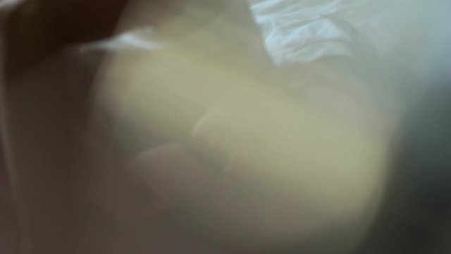 couple luxuriating on a bed.