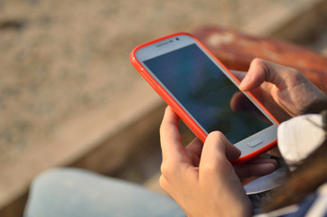 Teenage girl using smart phones