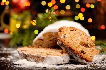 Stollen in icing sugar with colored bokeh