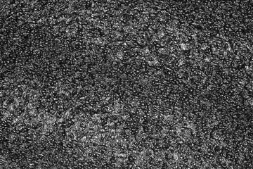 Black plastic foam texture. Foam rubber texture for background.