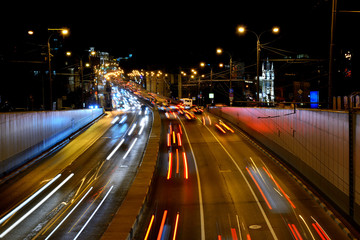 Fototapeta na wymiar Evening car traffic on a Moscow street.