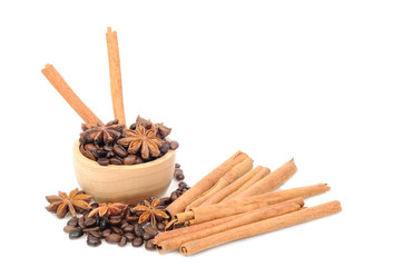 Chinese star aniseed Cinnamon and Coffee seeds on white backgrou