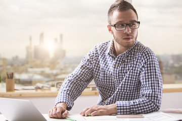 Concentrated man at workplace