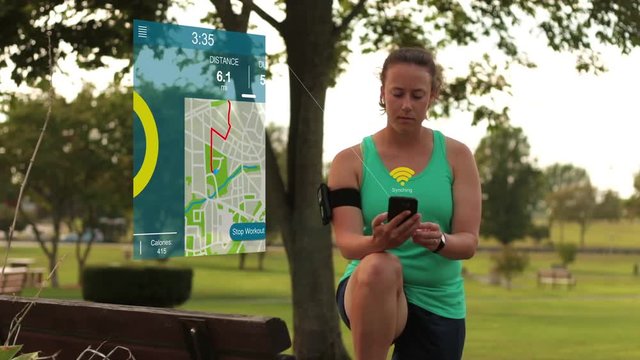 Athlete Checking Fitness Stats on Smart Phone with Graphics