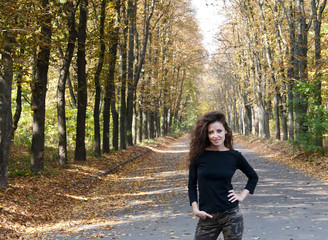 pretty woman in autumn forest