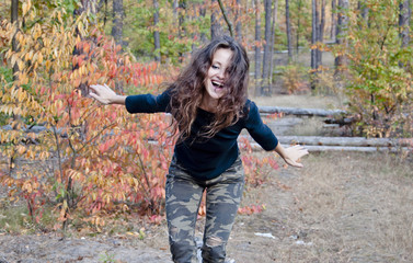 pretty smiling woman in forest