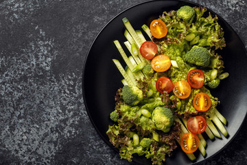 Fresh vegetables salad, top view.