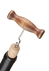 pulling corkscrew cork from the bottle