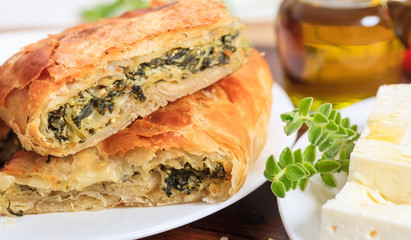 Spinach pie pieces on a table