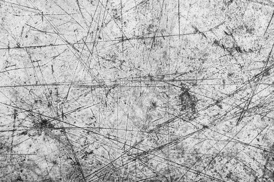 Gray scratched metal surface.