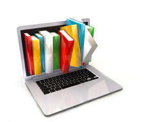  E-book library concept with laptop computer and books 