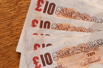Banknotes of the pound sterling. - obrazy, fototapety, plakaty