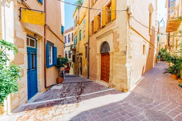 Fotobehang Venetian architecture in narrow stone streets of old town Chania in Crete, Greece © aetherial