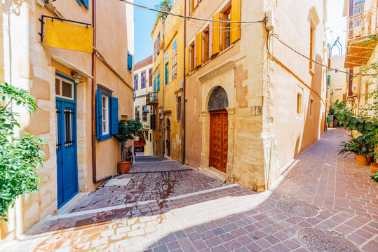 Fototapeta Venetian architecture in narrow stone streets of old town Chania in Crete, Greece