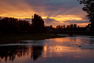 Fototapeta premium sunset over the river