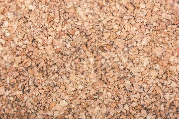 Brown cork board background.