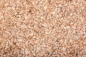 Brown cork board background.